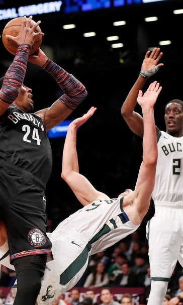 Giannis, Bucks beat cold-shooting Nets 113-94